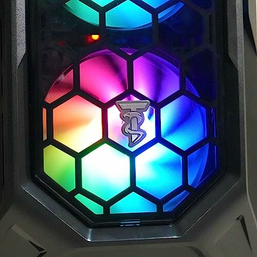 Close-up of RGB gaming PC fan with hexagonal grill.
